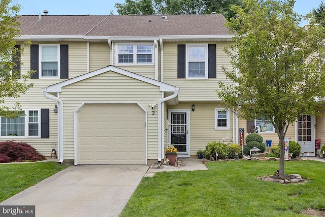 2 Gloucester Ct, Bordentown, NJ 08505 - townhome / multi-family property with driveway, a front yard, and an attached garage