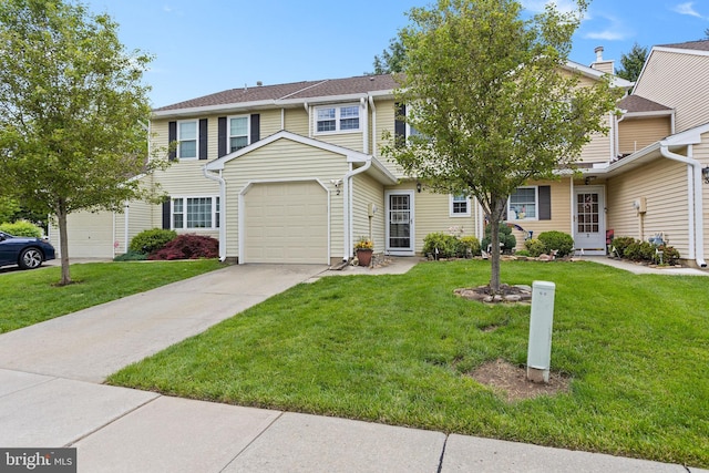 2 Gloucester Ct, Bordentown, NJ 08505 - townhome / multi-family property featuring concrete driveway, a front yard, and a garage