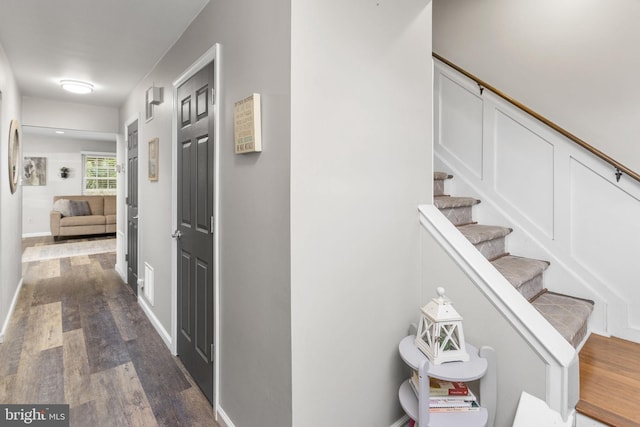 2 Gloucester Ct, Bordentown, NJ 08505 - hallway featuring dark wood-type flooring, stairs, and baseboards