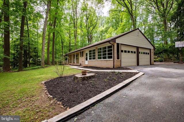 1906 Parkvue Rd, Fallston, MD 21047 - ranch-style house featuring brick siding, a front yard, and driveway