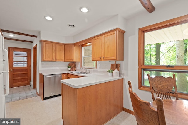 1906 Parkvue Rd, Fallston, MD 21047 - kitchen featuring stainless steel dishwasher, light countertops, a peninsula, healthy amount of natural light, and recessed lighting