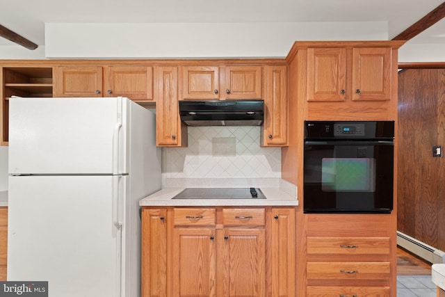 1906 Parkvue Rd, Fallston, MD 21047 - kitchen featuring black appliances, under cabinet range hood, a baseboard heating unit, tasteful backsplash, and light countertops