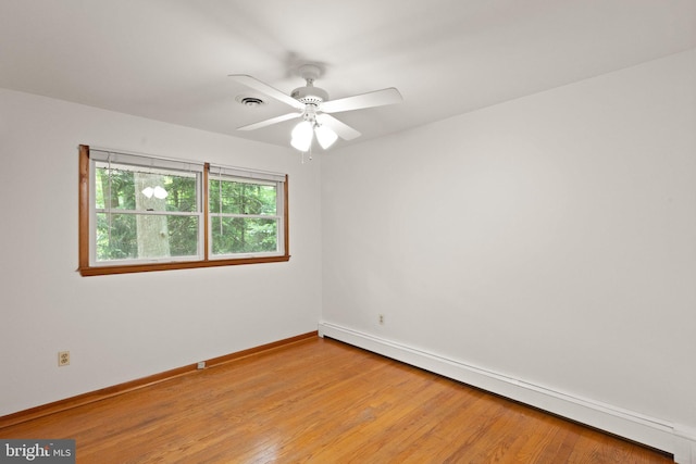 1906 Parkvue Rd, Fallston, MD 21047 - unfurnished room featuring a baseboard radiator, light wood-style floors, and a ceiling fan