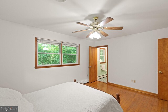 1906 Parkvue Rd, Fallston, MD 21047 - bedroom featuring a baseboard radiator, hardwood / wood-style flooring, and ceiling fan