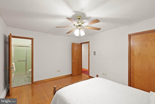 1906 Parkvue Rd, Fallston, MD 21047 - bedroom featuring baseboard heating, wood finished floors, ensuite bath, and ceiling fan