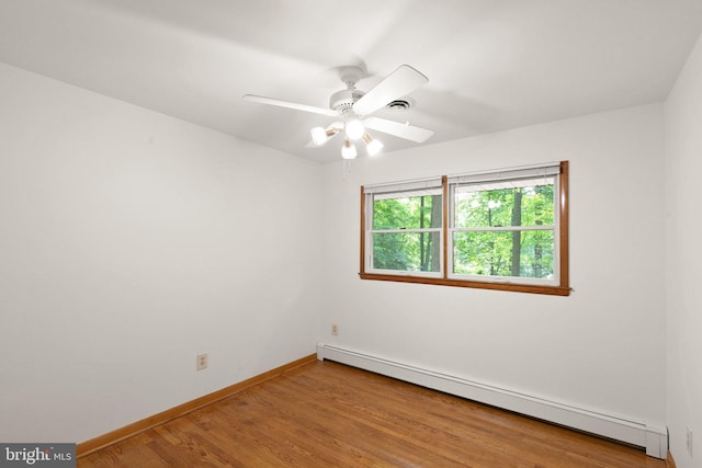 1906 Parkvue Rd, Fallston, MD 21047 - spare room with baseboard heating, a ceiling fan, and wood finished floors