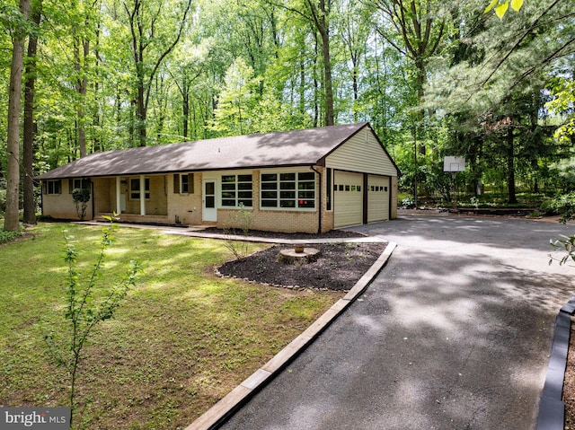 1906 Parkvue Rd, Fallston, MD 21047 - ranch-style home with brick siding, driveway, a garage, and a front lawn