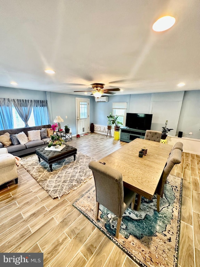 12403 Rambling Ln, Bowie, MD 20715 - living room featuring wood finished floors, plenty of natural light, recessed lighting, a ceiling fan, and an AC wall unit