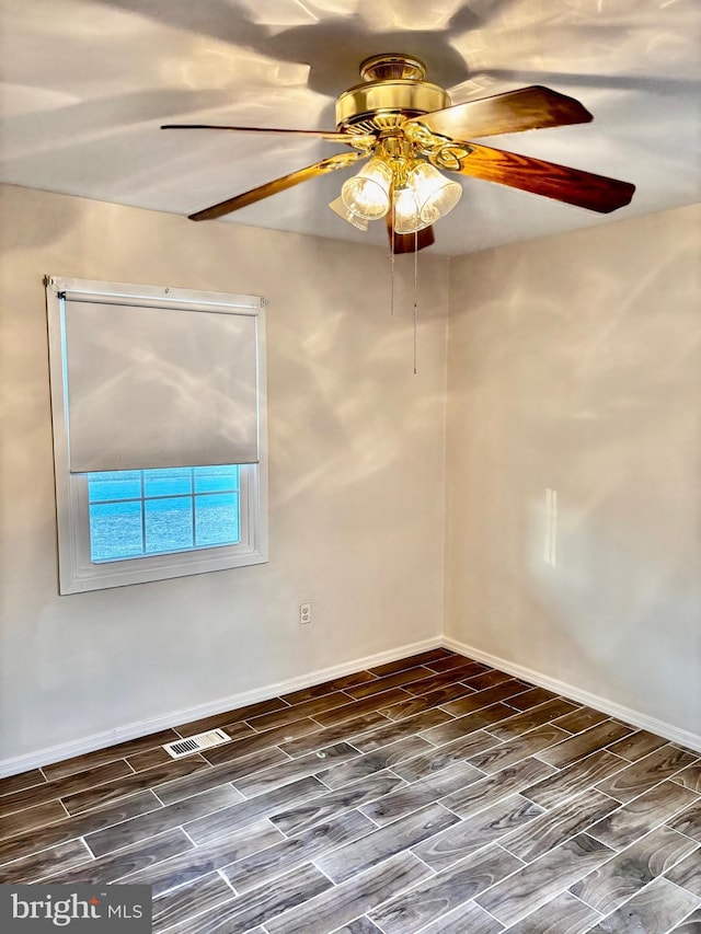 12403 Rambling Ln, Bowie, MD 20715 - empty room featuring ceiling fan, wood tiled floors, and baseboards