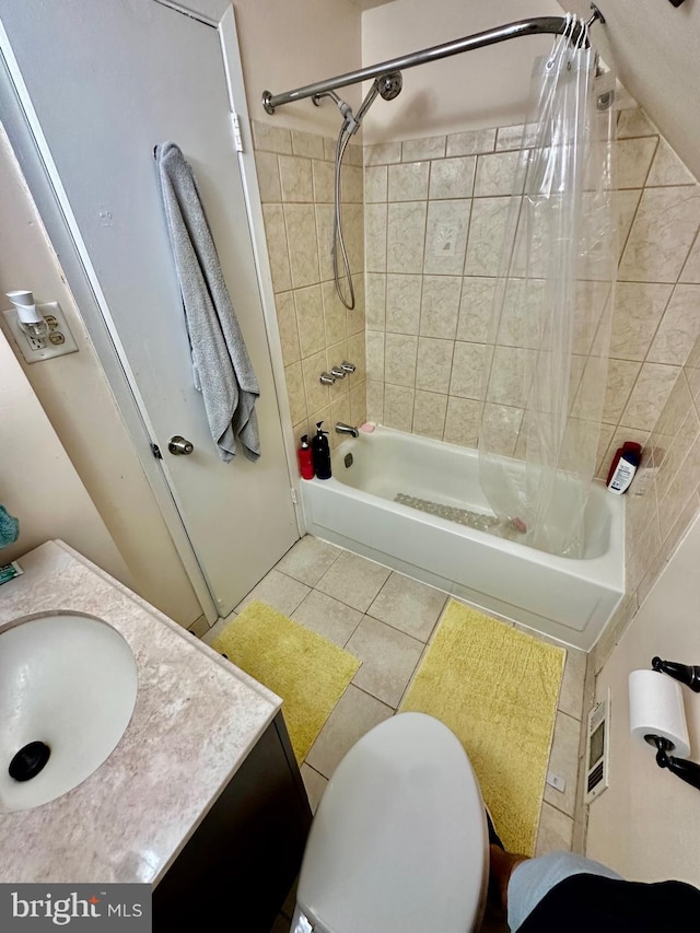 12403 Rambling Ln, Bowie, MD 20715 - full bath featuring shower / bath combo, tile patterned floors, vanity, and toilet