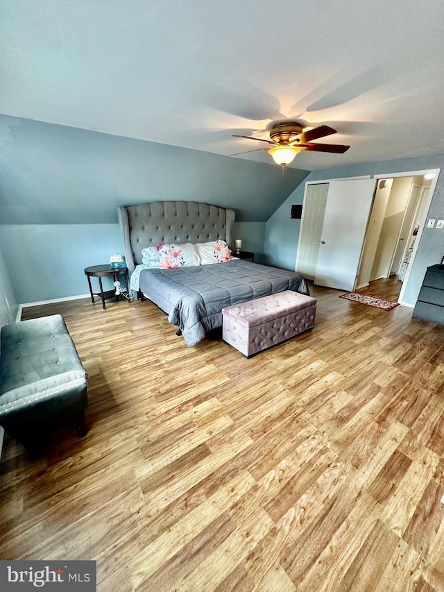 12403 Rambling Ln, Bowie, MD 20715 - bedroom featuring vaulted ceiling, wood finished floors, baseboards, and ceiling fan