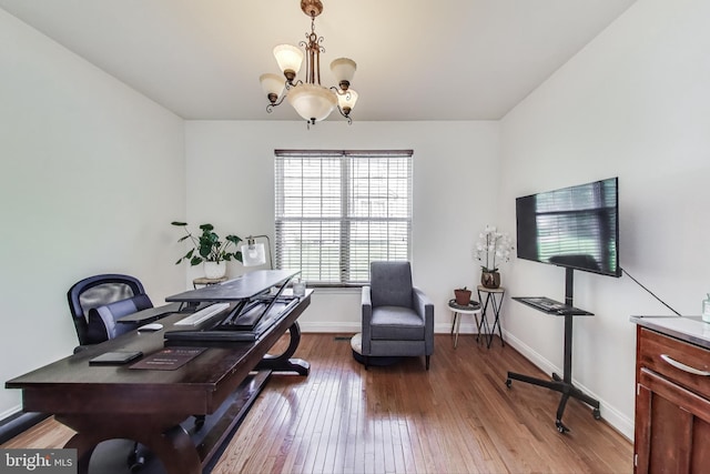 7009 Shagbark Ct, Fort Washington, MD 20744 - home office with a chandelier, wood-type flooring, and baseboards