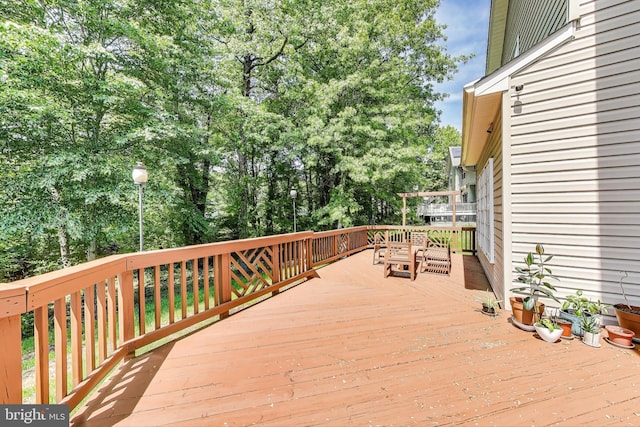 7009 Shagbark Ct, Fort Washington, MD 20744 - wooden terrace featuring view of scattered trees