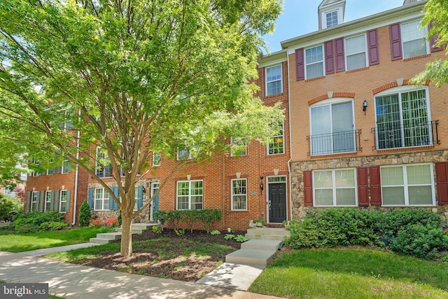 23412 Berkeley Meadows Dr, Ashburn, VA 20148 - view of property featuring stone siding
