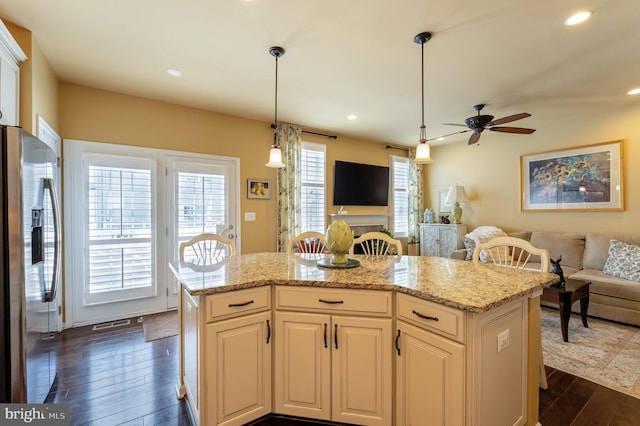 23412 Berkeley Meadows Dr, Ashburn, VA 20148 - kitchen featuring stainless steel fridge, open floor plan, dark wood-style floors, ceiling fan, and recessed lighting