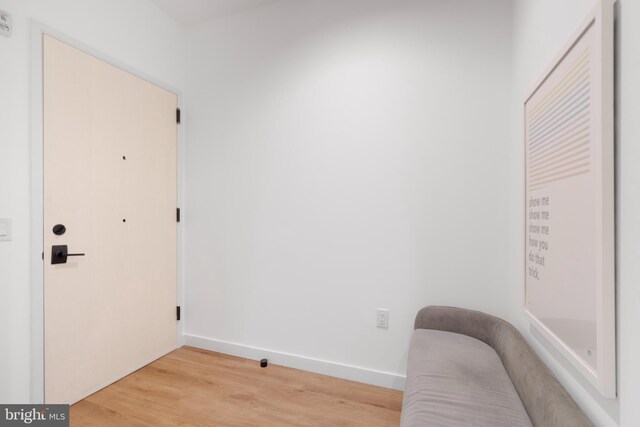 57 N St NW Unit 134, Washington, DC 20001 - living area with light wood-type flooring and baseboards