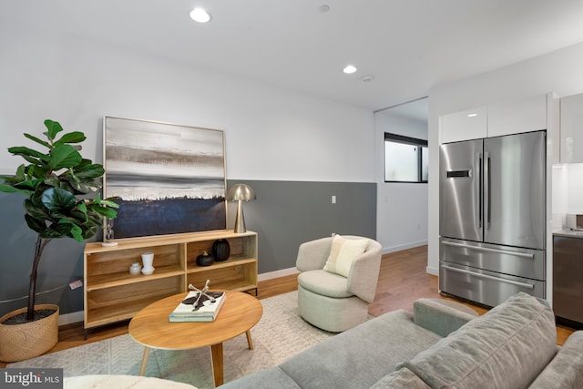 57 N St NW Unit 134, Washington, DC 20001 - living area with wood finished floors, baseboards, and recessed lighting