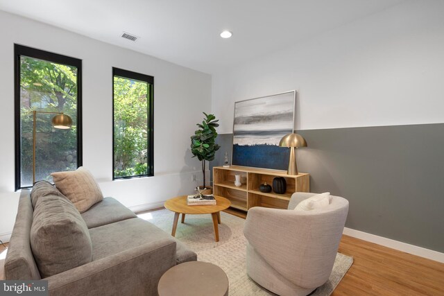 57 N St NW Unit 134, Washington, DC 20001 - living room featuring wood finished floors, recessed lighting, and baseboards