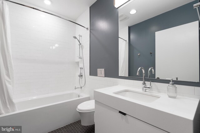 57 N St NW Unit 134, Washington, DC 20001 - bathroom featuring shower / bath combination with curtain, vanity, tile patterned flooring, toilet, and recessed lighting