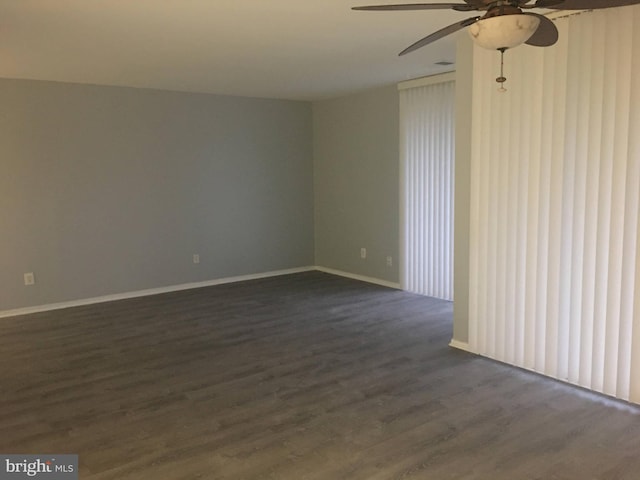 10241 Prince Pl Unit 27-T3, Upper Marlboro, MD 20774 - empty room with ceiling fan, dark wood-type flooring, and baseboards