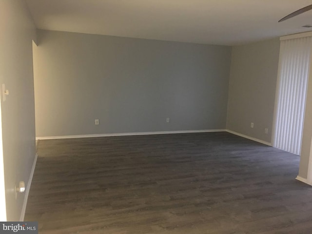 10241 Prince Pl Unit 27-T3, Upper Marlboro, MD 20774 - empty room featuring dark wood-style flooring, baseboards, and ceiling fan