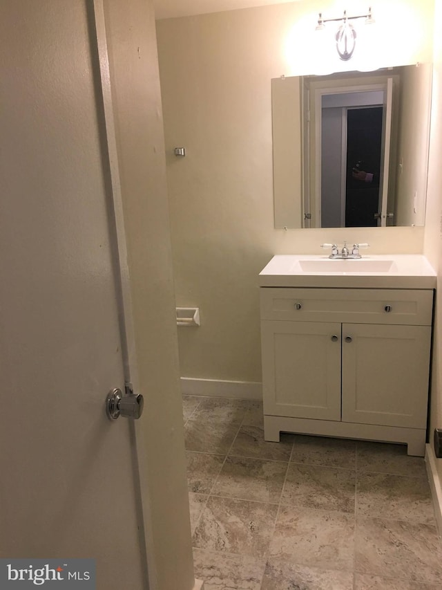 10241 Prince Pl Unit 27-T3, Upper Marlboro, MD 20774 - bathroom with vanity and baseboards