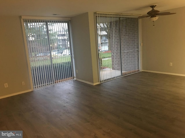 10241 Prince Pl Unit 27-T3, Upper Marlboro, MD 20774 - unfurnished room featuring wood finished floors, healthy amount of natural light, baseboards, and a ceiling fan