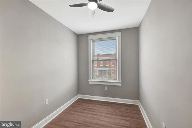 771 N Grantley St, Baltimore, MD 21229 - unfurnished room with ceiling fan, baseboards, and dark wood finished floors