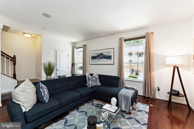 6315 Halsted Ave, Capitol Heights, MD 20743 - living area featuring wood finished floors, stairway, and baseboards
