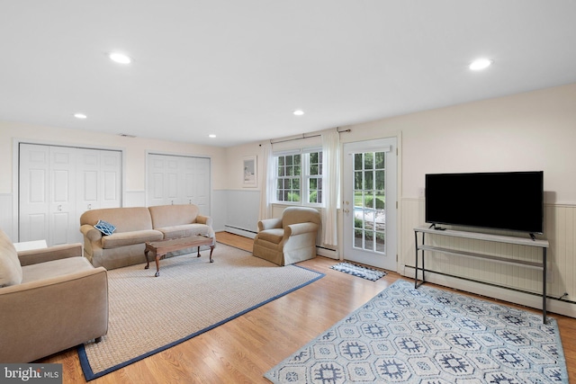 10 Old Orchard Ln, Chadds Ford, PA 19317 - living area with baseboard heating, wood finished floors, wainscoting, and recessed lighting
