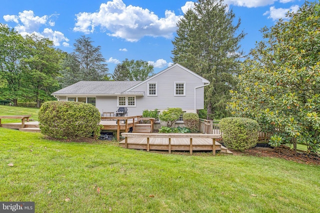 10 Old Orchard Ln, Chadds Ford, PA 19317 - rear view of house featuring a deck, a yard, and roof with shingles