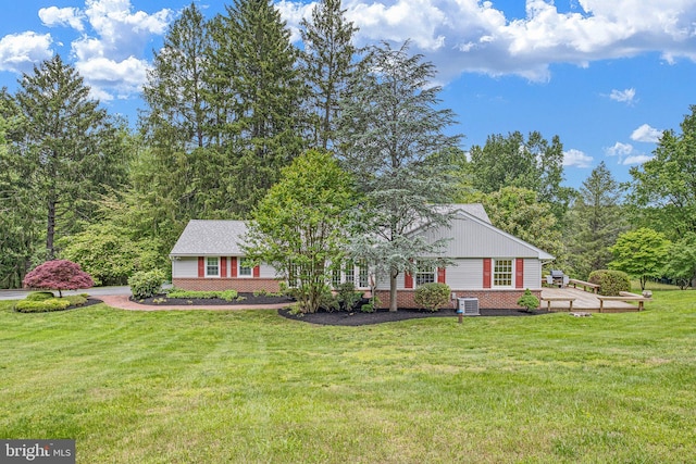 10 Old Orchard Ln, Chadds Ford, PA 19317 - view of front facade with a front yard, central AC unit, and a patio area