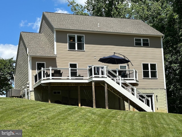 109 Brenda Joyce Ln, Severna Park, MD 21146 - back of property with a wooden deck, stairway, a yard, cooling unit, and roof with shingles