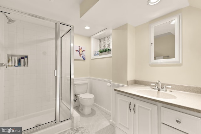 1861 S George Mason Dr, Arlington, VA 22204 - bathroom featuring vanity, a stall shower, toilet, recessed lighting, and a wainscoted wall