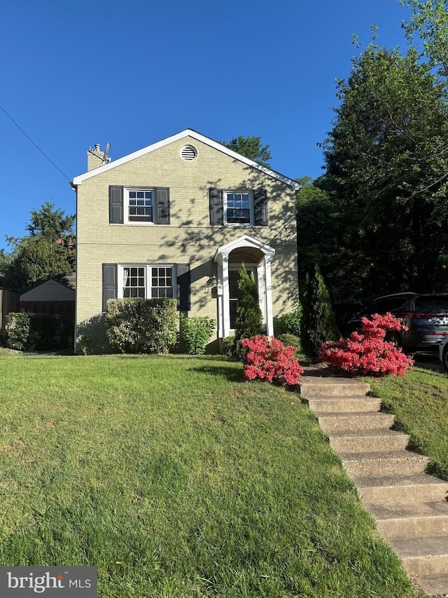 1861 S George Mason Dr, Arlington, VA 22204 - traditional home with a front yard and a chimney
