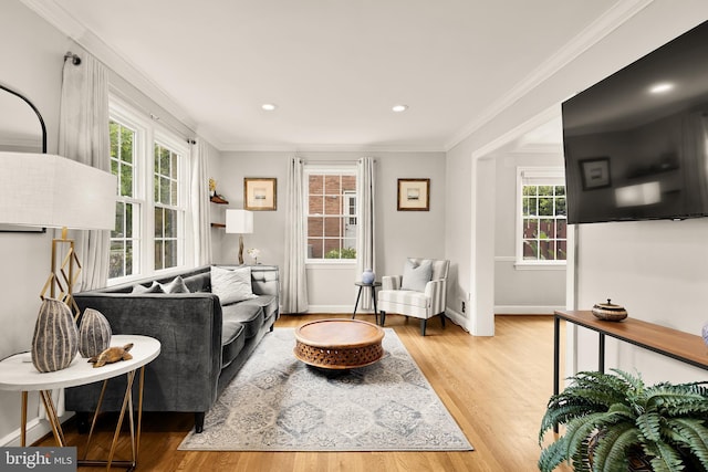 1861 S George Mason Dr, Arlington, VA 22204 - living area with healthy amount of natural light, wood finished floors, baseboards, crown molding, and recessed lighting
