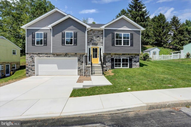 12366 Benning Ave, Waynesboro, PA 17268 - raised ranch featuring stone siding, an attached garage, and concrete driveway