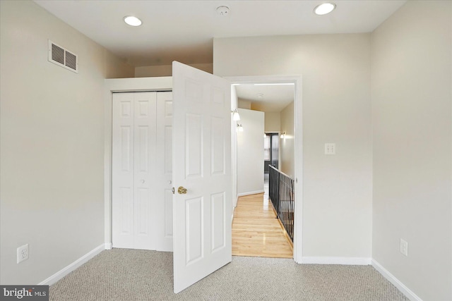 1225 W Cross St, Baltimore, MD 21230 - corridor with carpet flooring, recessed lighting, and baseboards