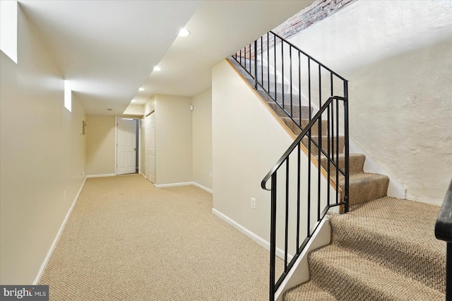 1225 W Cross St, Baltimore, MD 21230 - stairs featuring baseboards, recessed lighting, and carpet floors