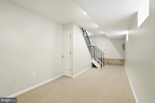 1225 W Cross St, Baltimore, MD 21230 - finished basement with carpet flooring, baseboards, and stairway