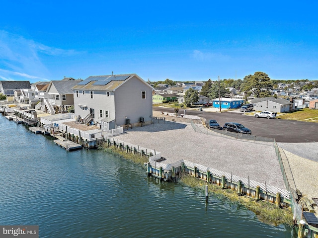 128 E Delaware Dr, Little Egg Harbor Twp, NJ 08087 - aerial view of residential area with a nearby body of water