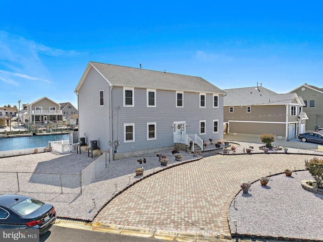 128 E Delaware Dr, Little Egg Harbor Twp, NJ 08087 - rear view of house with a residential view and central air condition unit