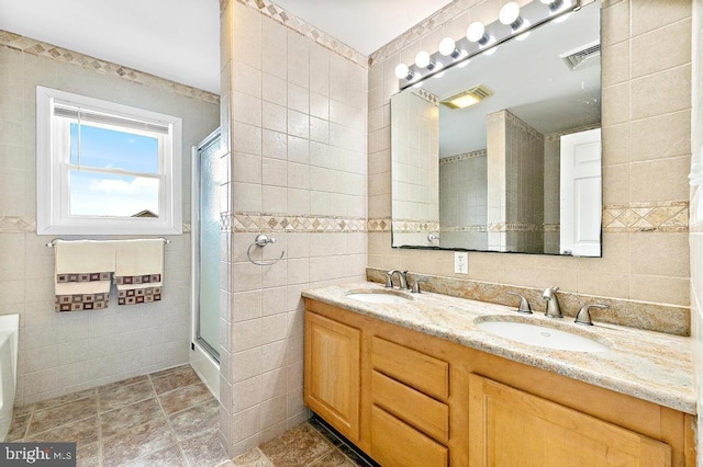 128 E Delaware Dr, Little Egg Harbor Twp, NJ 08087 - full bath featuring tile walls, double vanity, and a shower stall