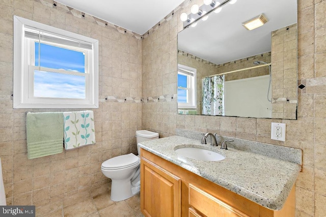 128 E Delaware Dr, Little Egg Harbor Twp, NJ 08087 - full bath featuring tile walls, vanity, toilet, and curtained shower