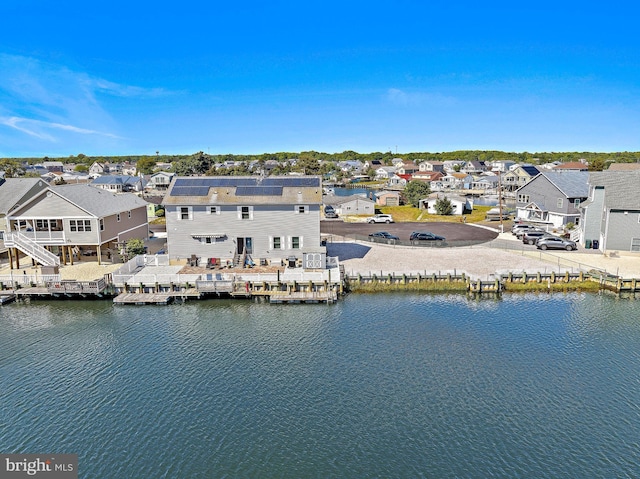 128 E Delaware Dr, Little Egg Harbor Twp, NJ 08087 - aerial view of residential area featuring a large body of water