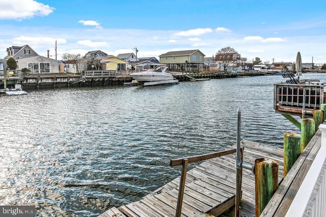 128 E Delaware Dr, Little Egg Harbor Twp, NJ 08087 - dock with a water view and a residential view