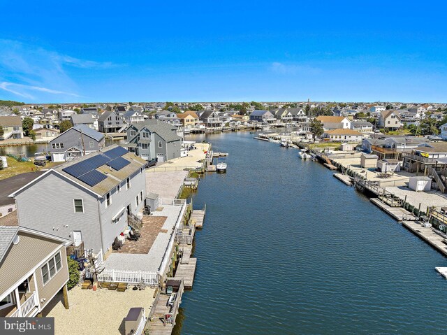 128 E Delaware Dr, Little Egg Harbor Twp, NJ 08087 - aerial perspective of suburban area featuring a nearby body of water