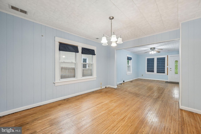 4311 Quinn St, Capitol Heights, MD 20743 - spare room with hardwood / wood-style floors, a chandelier, baseboards, crown molding, and ceiling fan