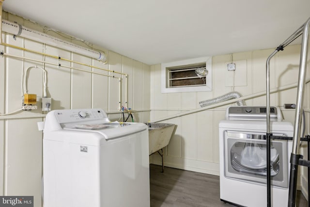 4311 Quinn St, Capitol Heights, MD 20743 - laundry area featuring separate washer and dryer and wood finished floors
