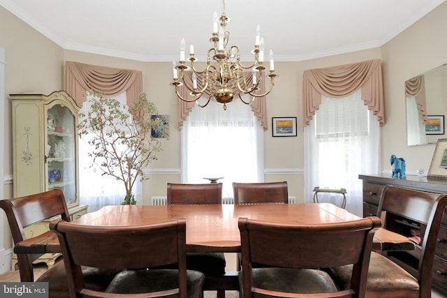 604 Market St, Pocomoke City, MD 21851 - dining room featuring a chandelier, ornamental molding, and healthy amount of natural light